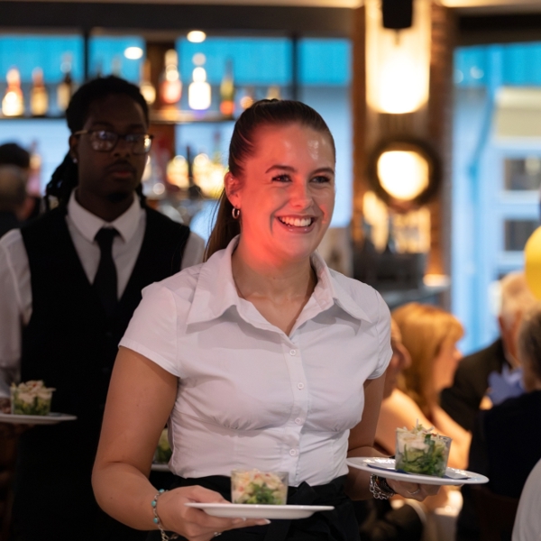 Professional Catering Staff Serving Event Guests - CIM Business Centre
