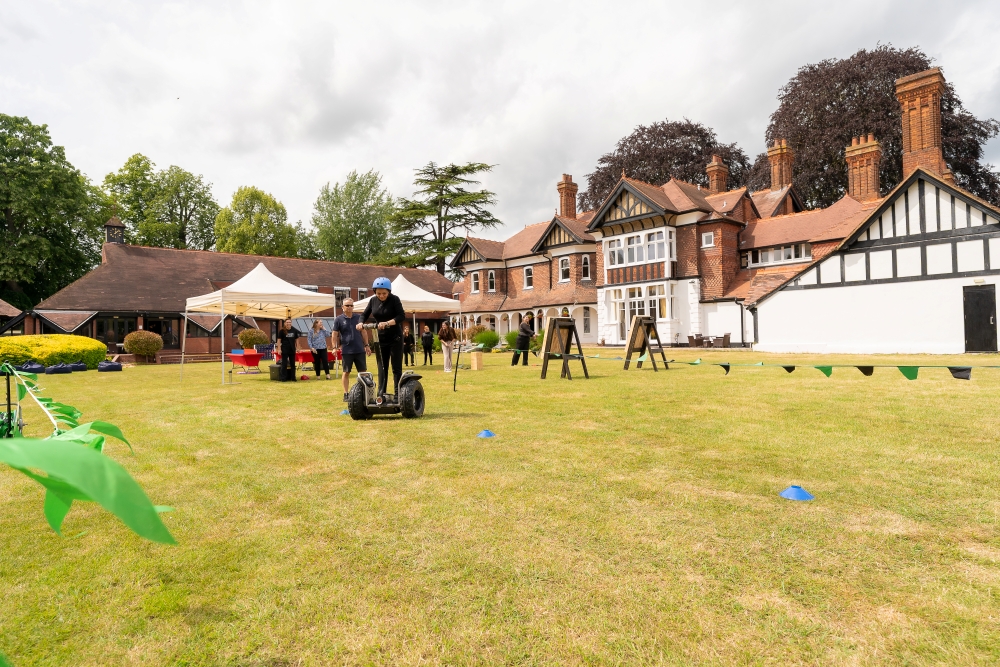 Outdoor team building activity on the Manor House lawns at CIM Business Centre in Berkshire